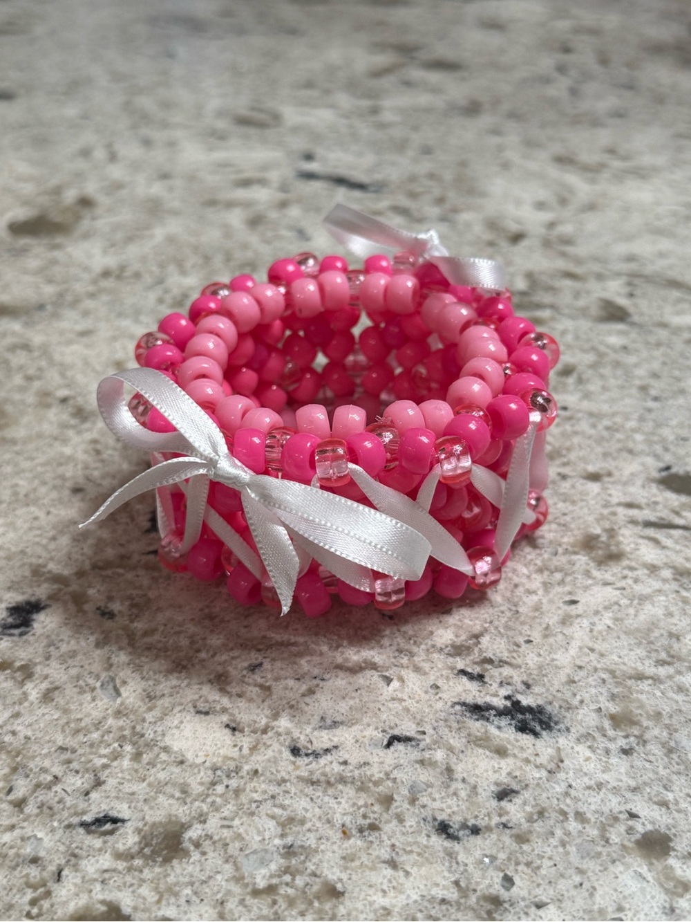 Pink Kandi cuff w white laced ribbon & bows 💕